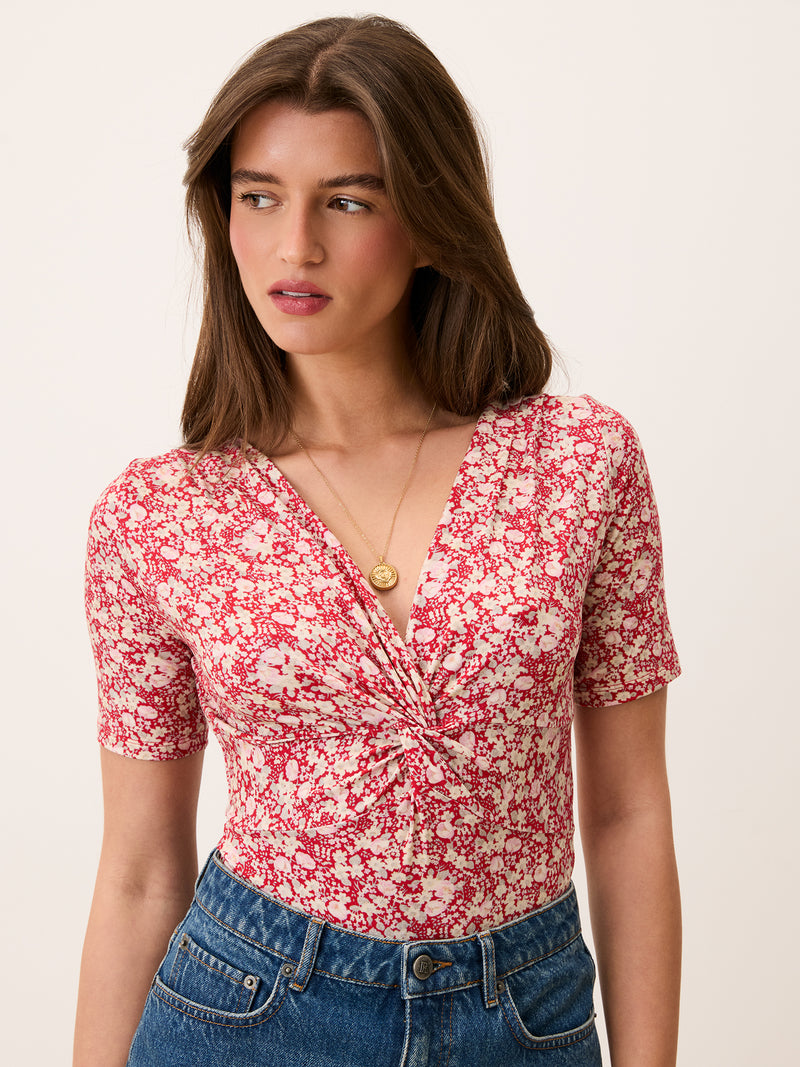 ANDERSON red floral bodysuit worn on a model by Rouje