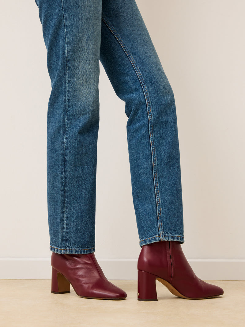 CLAUDIA burgundy leather ankle boots, back view showing R logo by Rouje