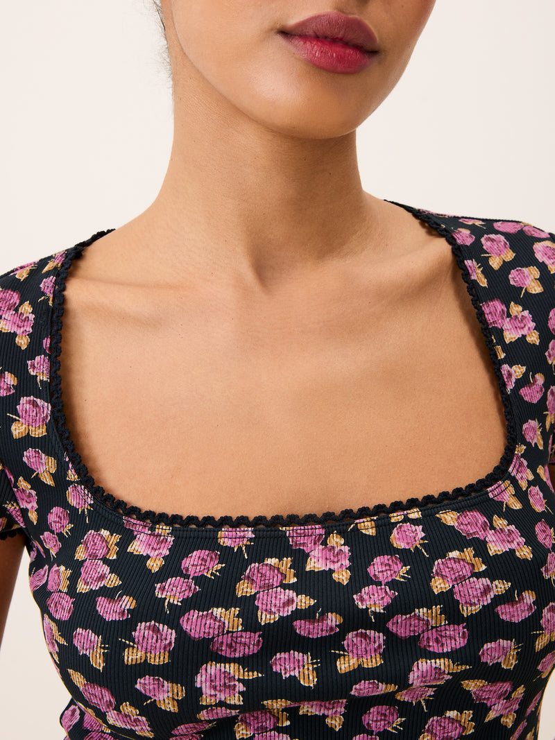 SIAM black floral square-neck T-shirt worn on a model by Rouje