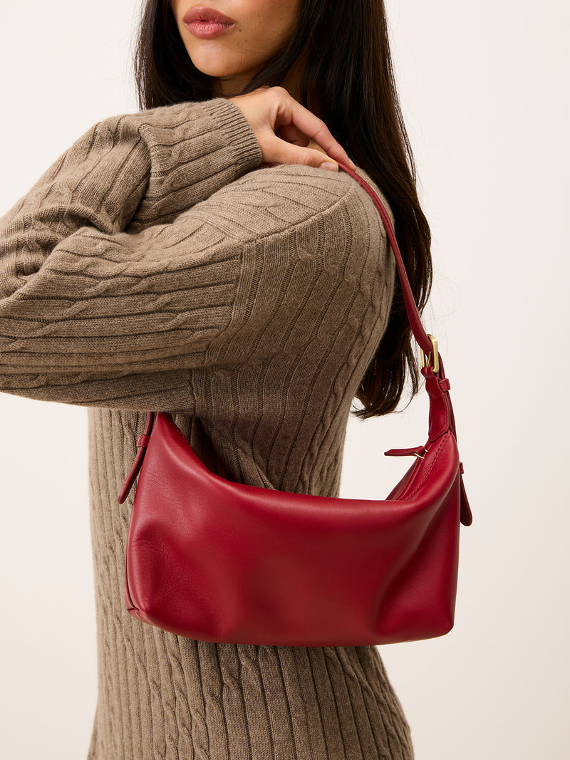 MINUIT red leather soft bag worn on a model by Rouje