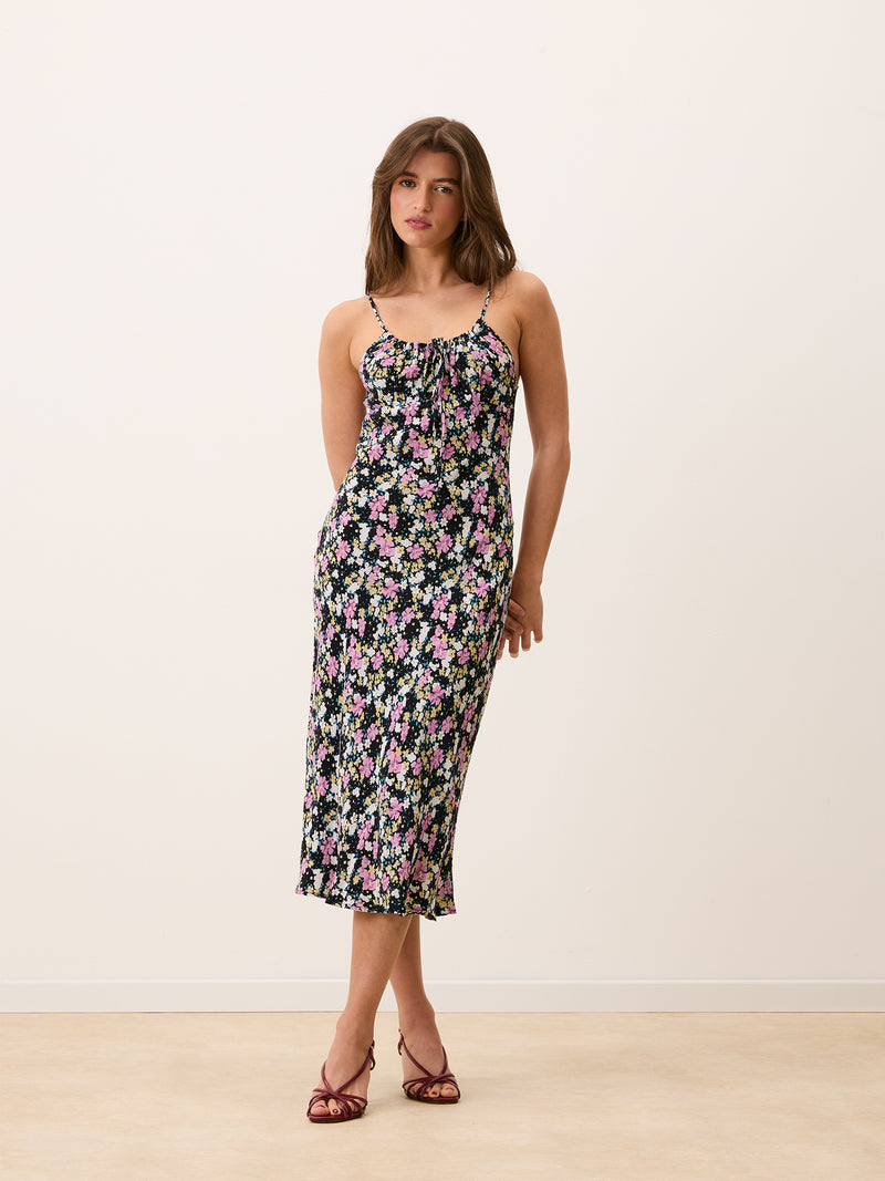 DARIA black Prairie floral spaghetti strap midi dress worn on a model by Rouje