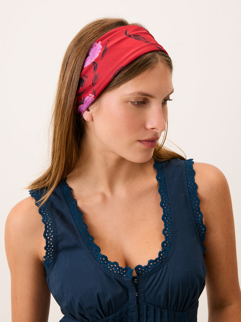 EDDY red floral silk scarf worn on a model by Rouje