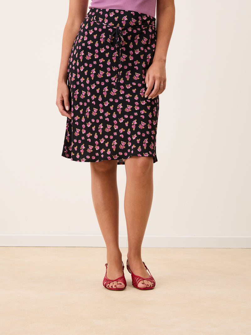 ILARIA black floral print midi skirt worn on a model by Rouje