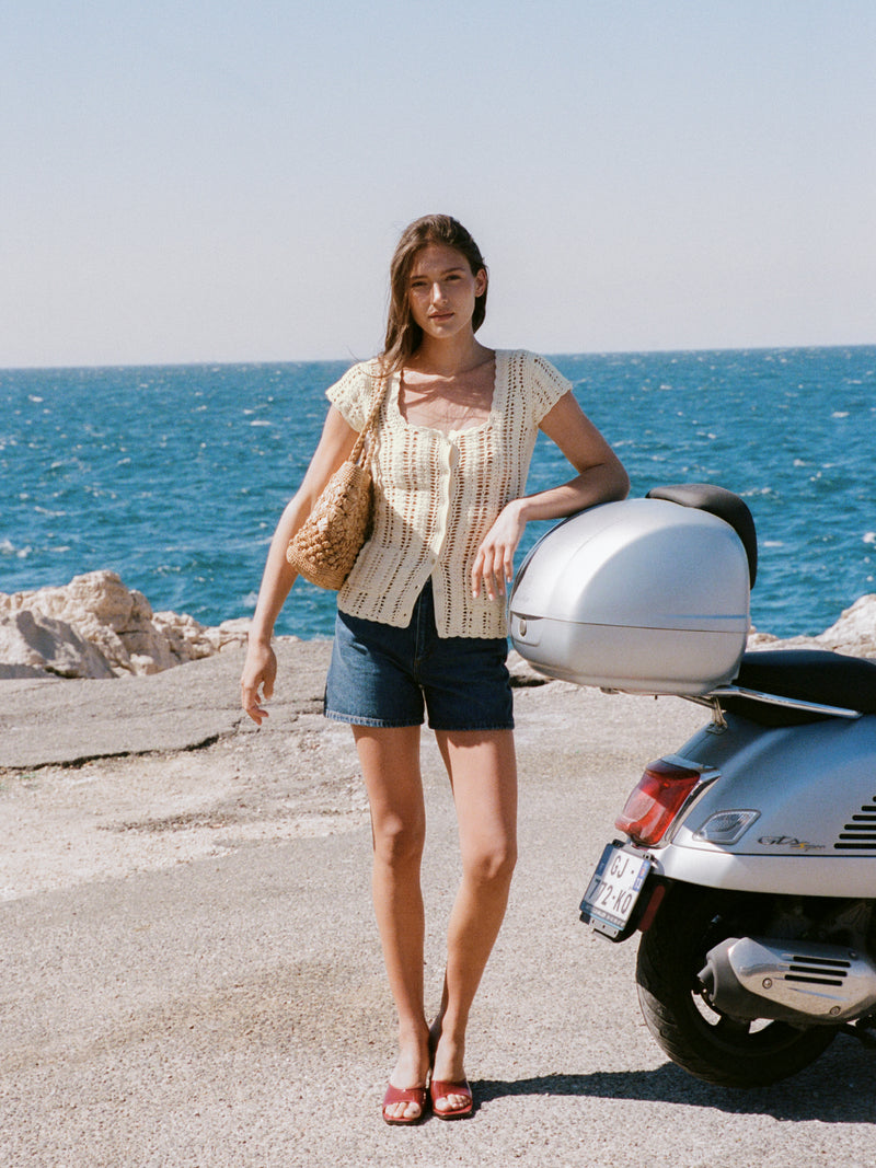JASMIN indigo denim mini shorts worn on a model by Rouje