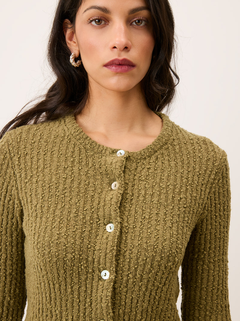 LOICA almond green ribbed cardigan worn on a model by Rouje