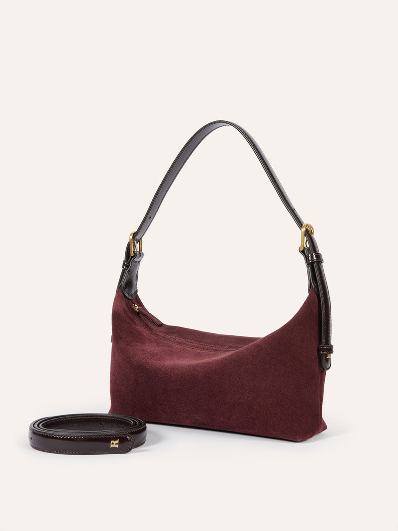 MINUIT plum calfskin soft bag worn on a model by Rouje
