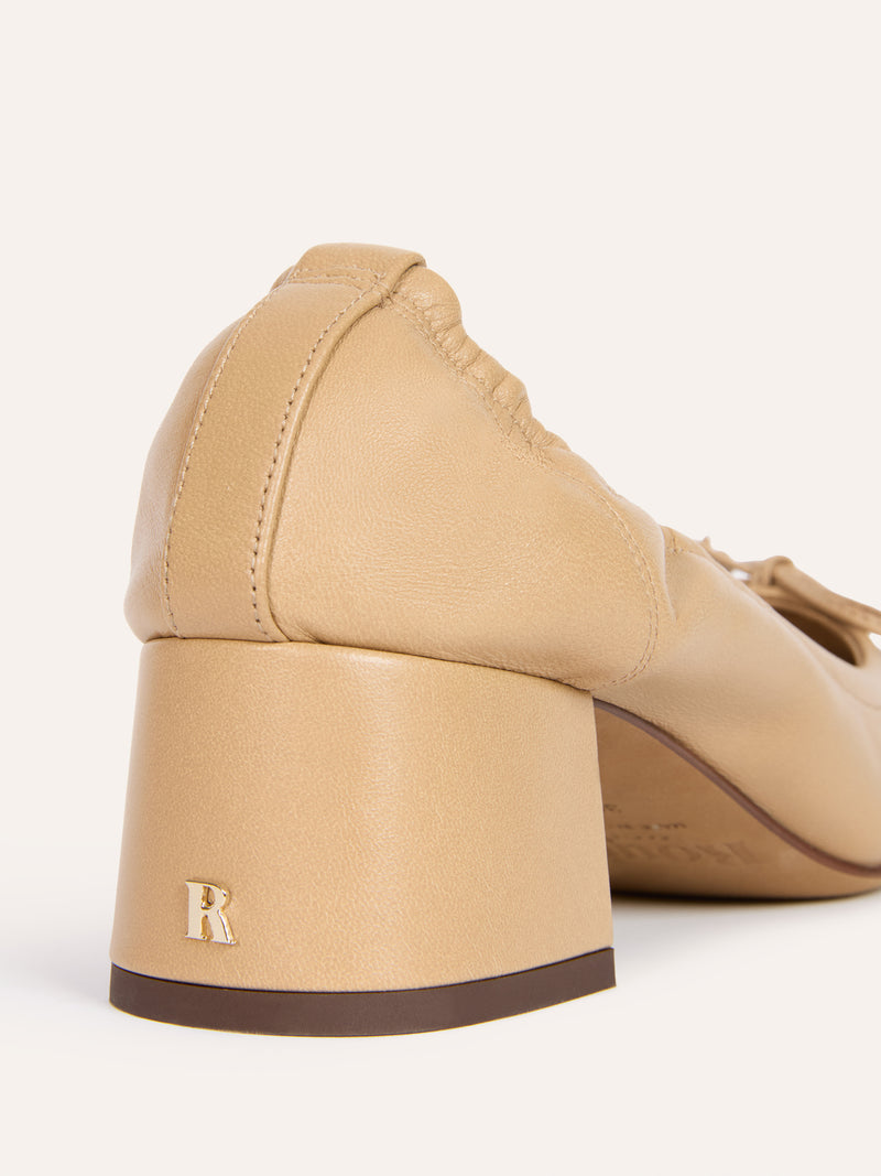 NICOISE desert beige leather ballerinas, back view showing gold R logo by Rouje