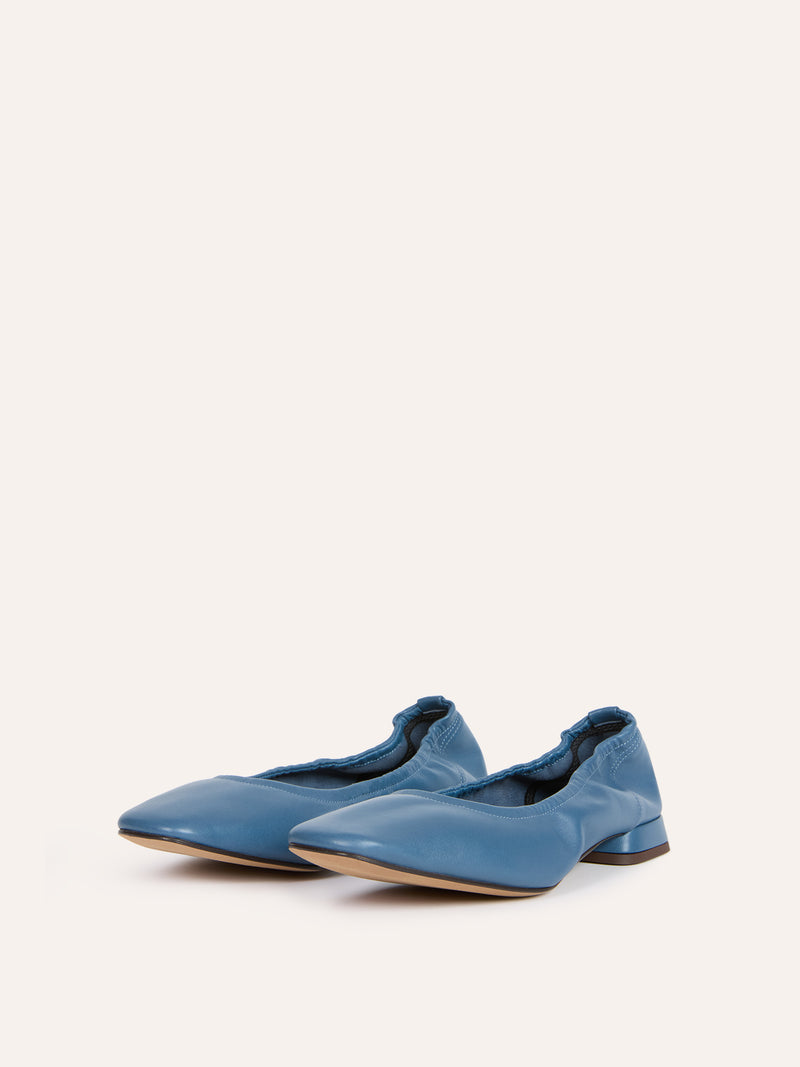 NINA denim-effect leather ballerinas worn on a model by Rouje