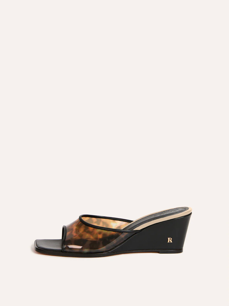 Natty black tortoiseshell mules, side view packshot