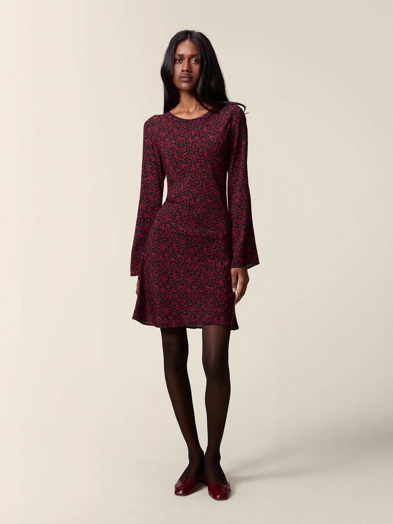 SANA black gypso print flowing floral short dress, front view by Rouje