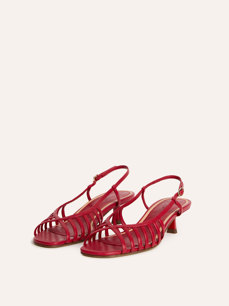 LOREN red leather kitten heel sandals worn on a model by Rouje