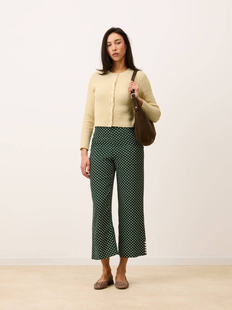 SUZON green polka-dot pants worn on a model by Rouje