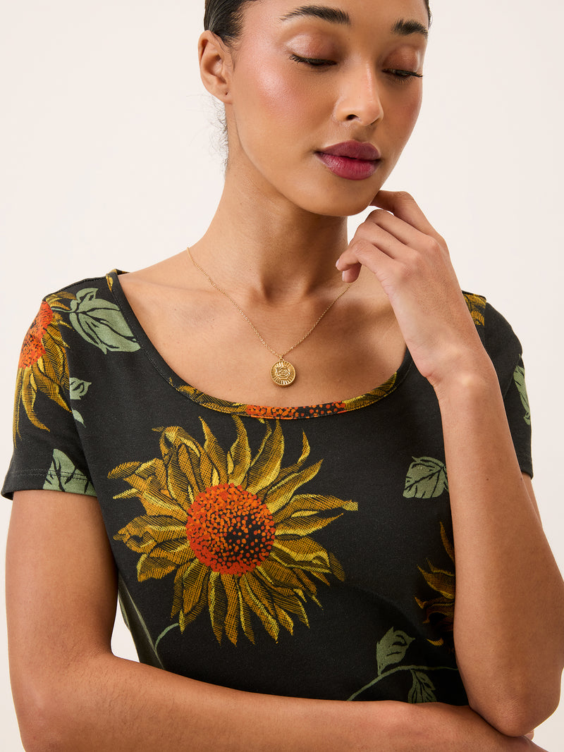 WINNIE black sunflower print short dress worn on a model by Rouje