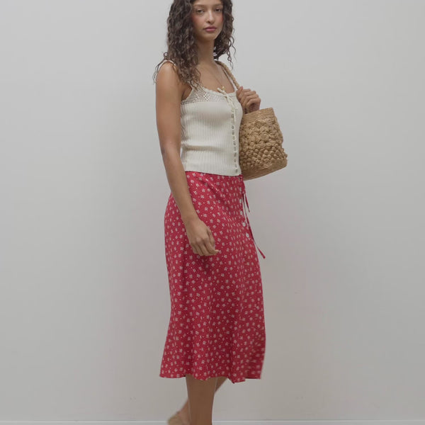 Video of Tarek ecru crochet top worn by a model